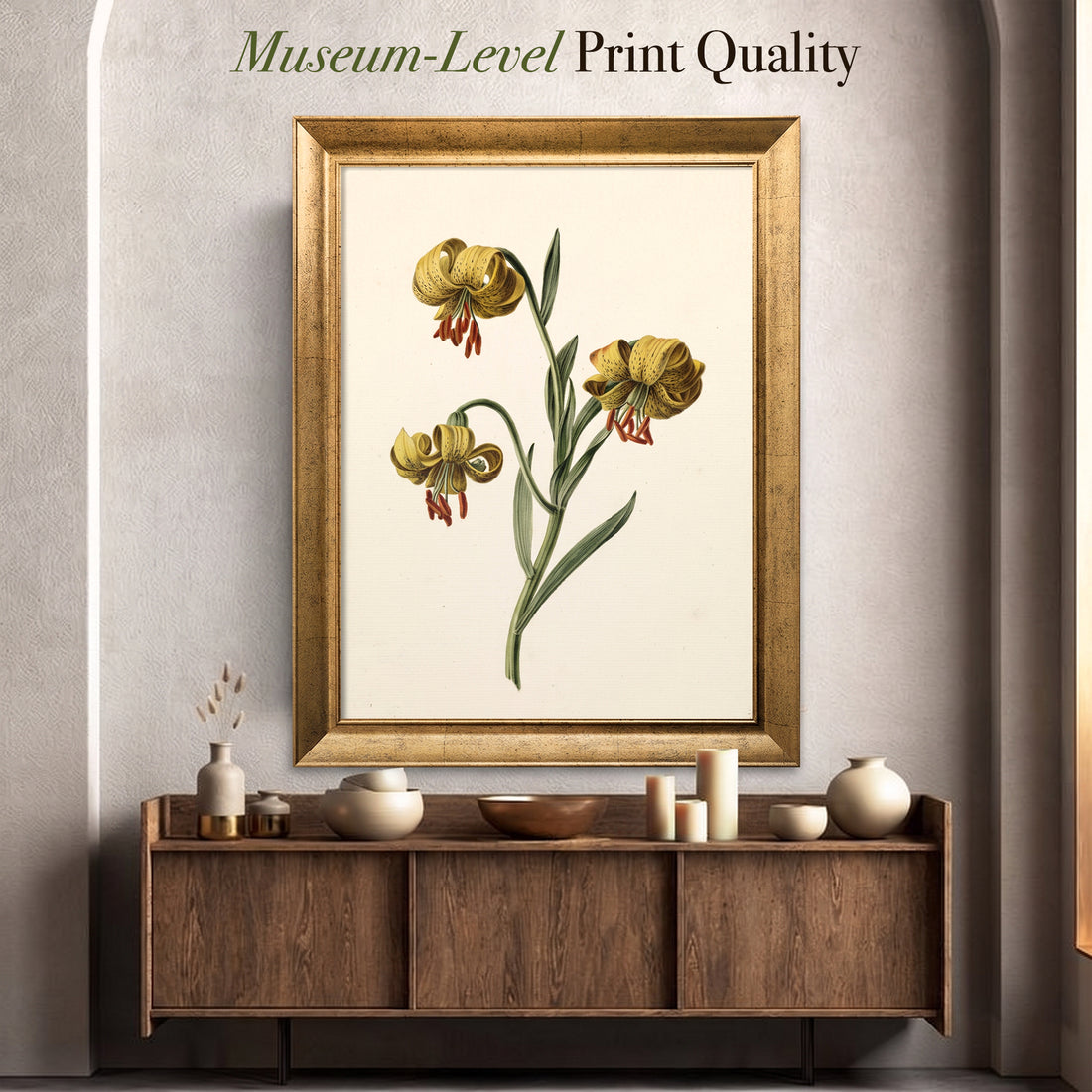 Yellow Lily Botanical canvas print in a gold frame on a sunlit white wall