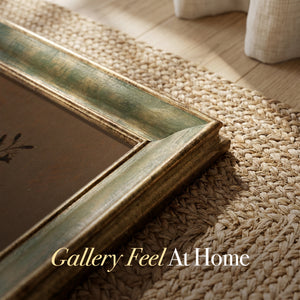 Flowers and dead frog still life (1634) canvas print: corner of the olive green frame resting on a woven jute rug