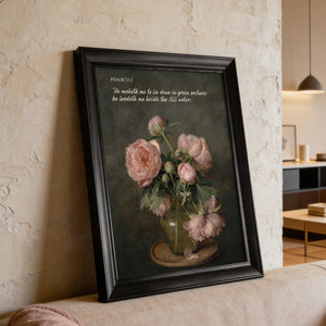 Pink Peonies Still Life scripture canvas print in a black frame leaning against a textured cream wall