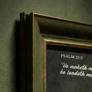 Pink Peonies Still Life scripture canvas print: close-up of the olive green frame against a dark green wall