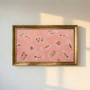 People Swimming in Pink Water Framed Canvas Print