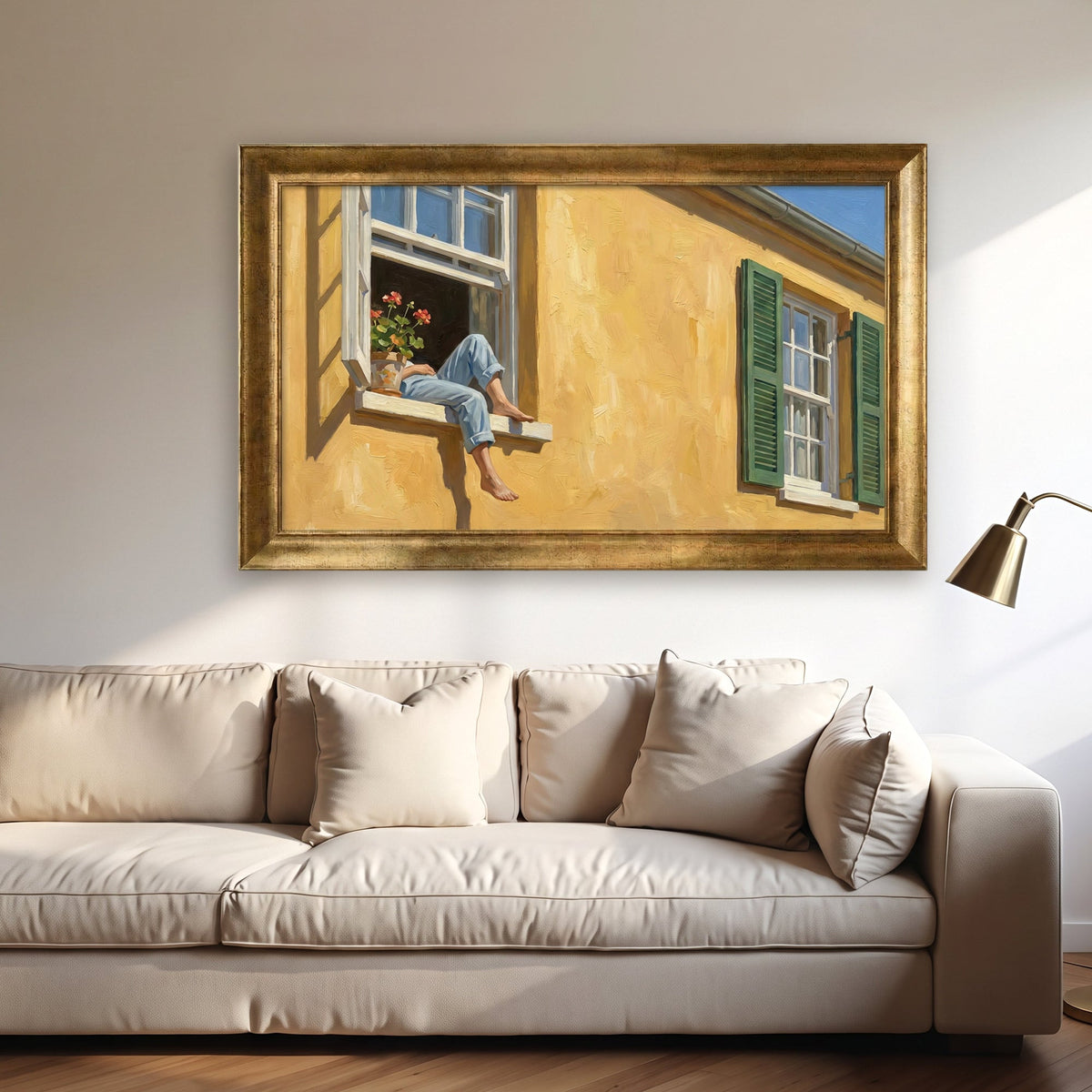 Framed canvas print of bare feet and blue jeans resting on a sunny yellow windowsill, Royal Gold frame over a sofa